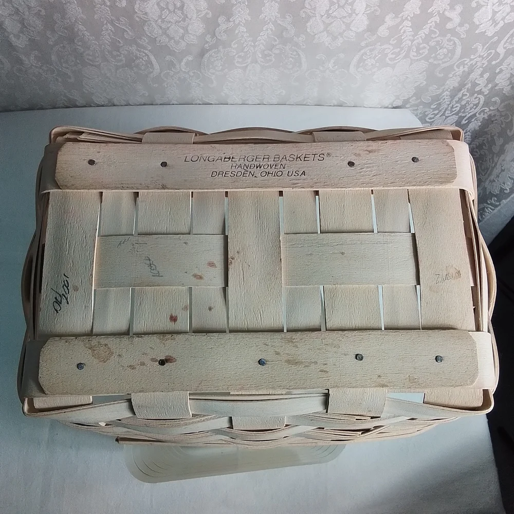 Longaberger light tan woven basket with handle and plastic insert